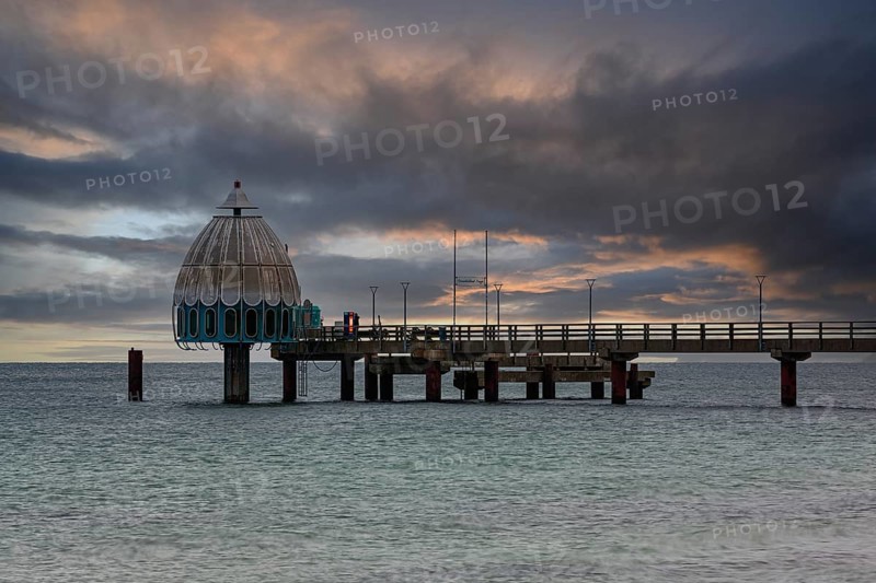 Diving gondola and pier at the beach of Zingst at sunrise