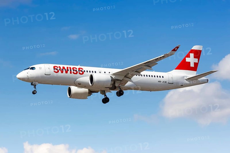 A Swiss Airbus A220-300 with the registration HB-JCM lands at London Heathrow Airport