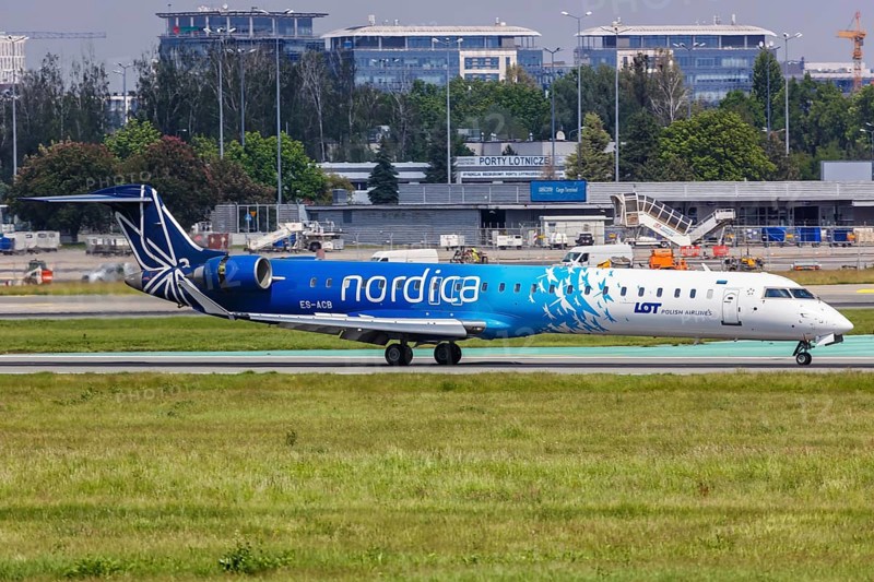 A Bombardier CRJ-900 aircraft of Nordica with registration number ES-ACB at Warsaw Airport