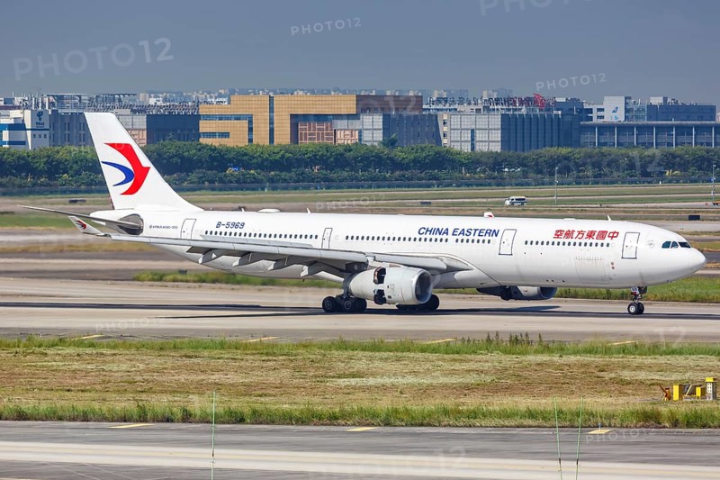 An Airbus A330-300 aircraft of China Eastern Airlines with registration number B-5969 at Guangzhou Baiyun Airport