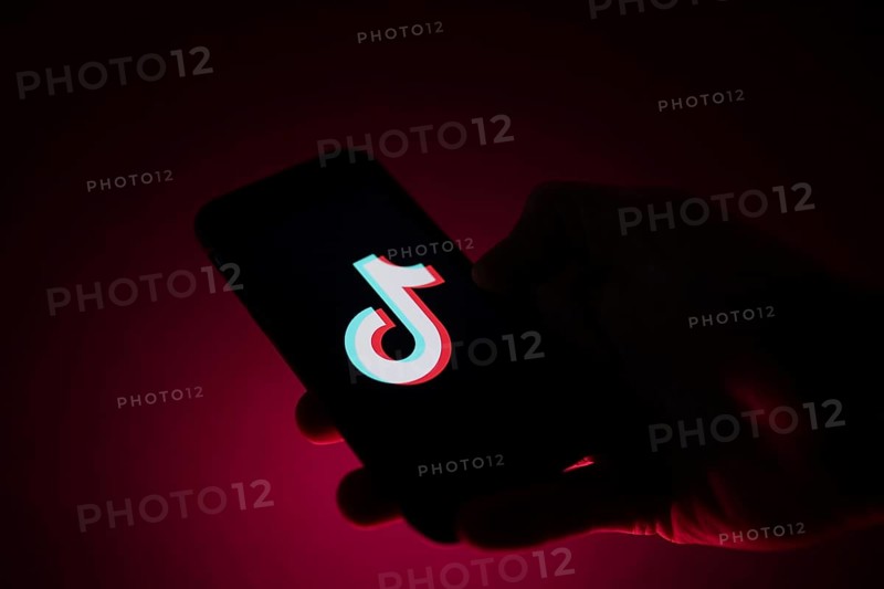 TikTok app on a smartphone in a hand