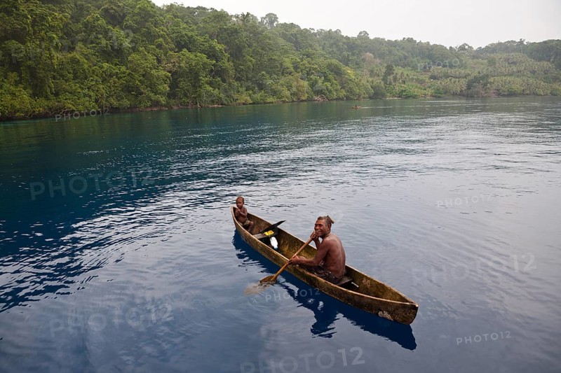 Indigenous people in monoboat