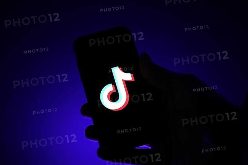 TikTok app on a smartphone in a hand
