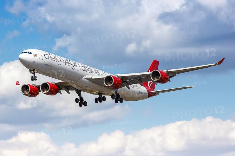 A Virgin Atlantic Airbus A340-600 with registration G-VNAP lands at London Heathrow Airport