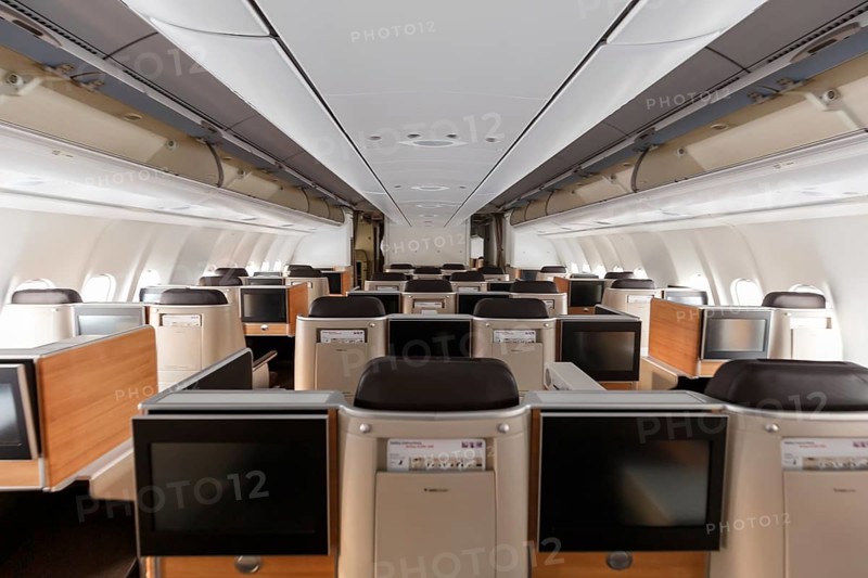 Business class cabin of an Airbus A340-300 aircraft of Swiss at Zurich airport