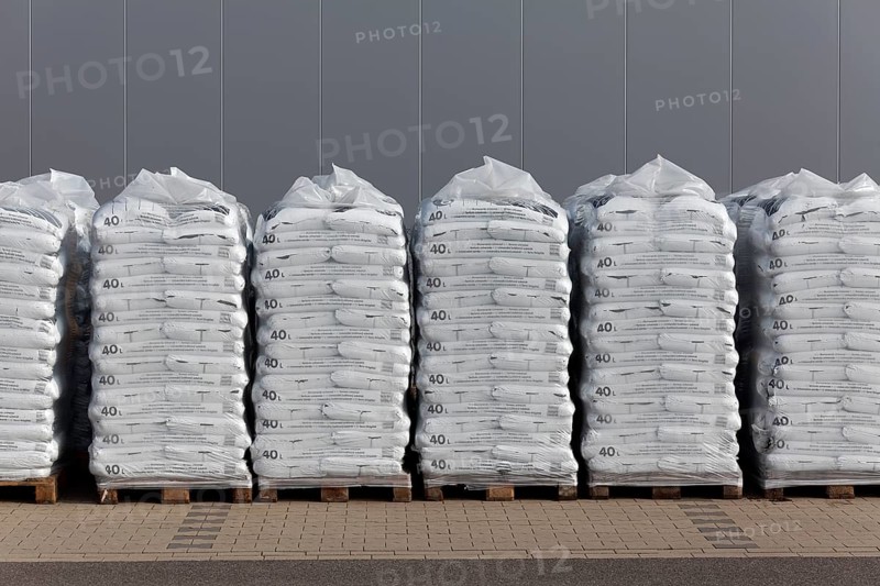 Stacked bags of potting soil and garden mulch for the spring shop