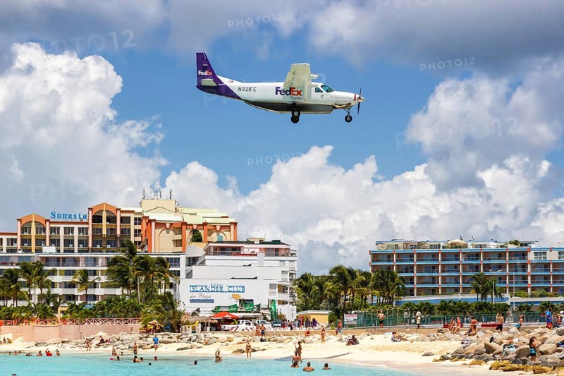 A Cessna 208 of FedEx Feeder with the registration N921FE at the airport St. Maarten