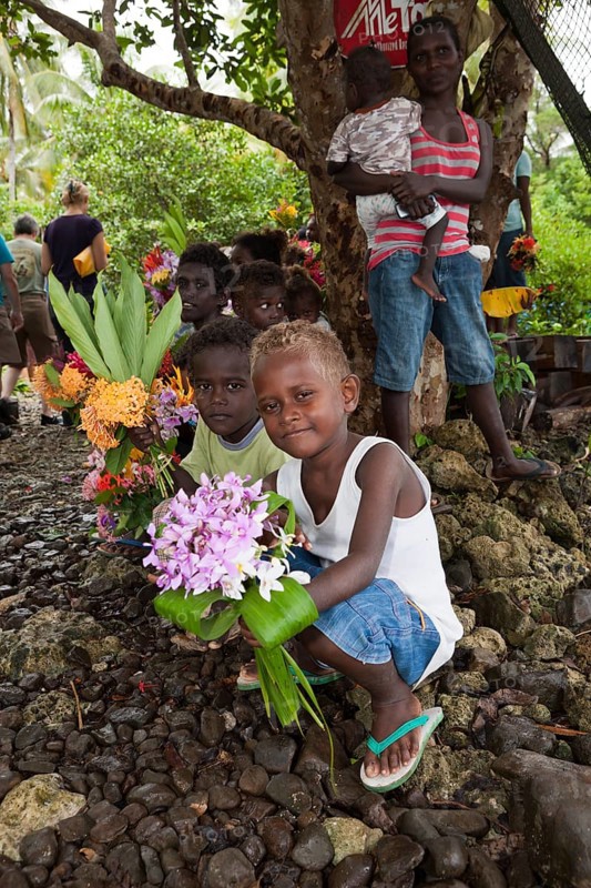 Telina Island locals greet visitors