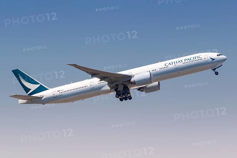 A Cathay Pacific Boeing 777-300ER aircraft with registration B-KQD at Hong Kong Airport