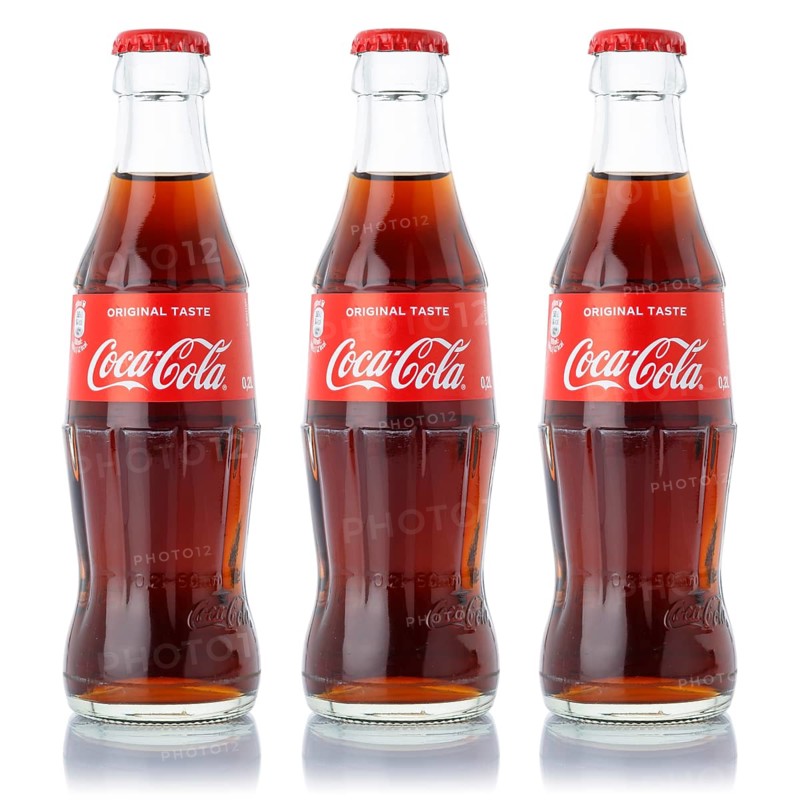 Coca Cola Coca-Cola lemonade soft drink drinks bottles cutout on white background