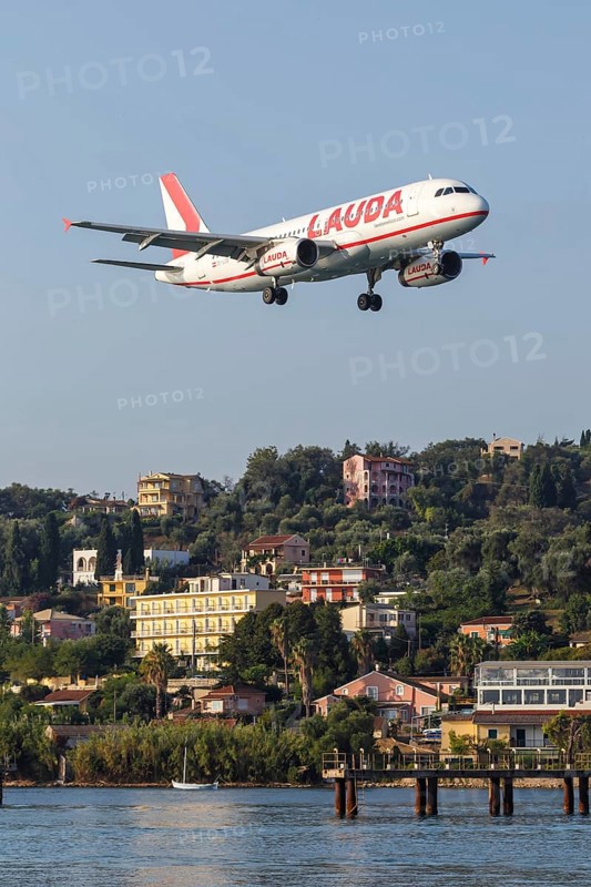 A Lauda Airbus A320 aircraft with registration number OE-LOB at Corfu Airport