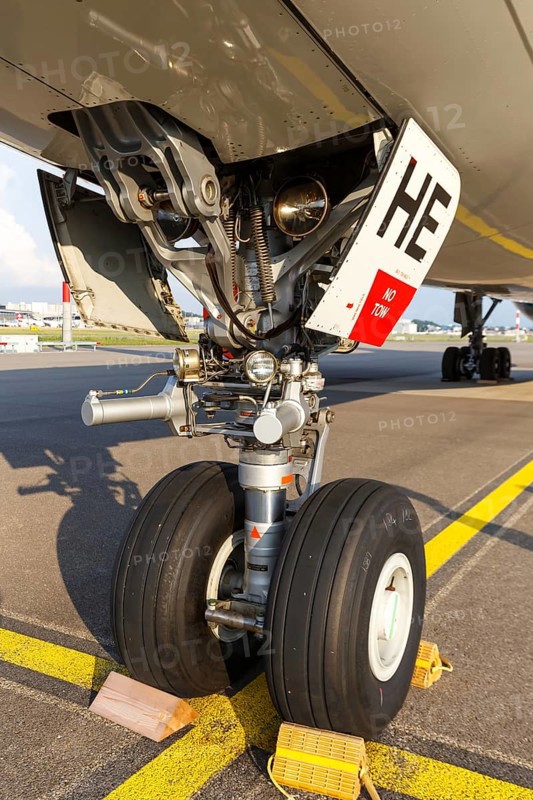 An Airbus A330-300 aircraft landing gear of Swiss with the registration HB-JHE at Zurich airport
