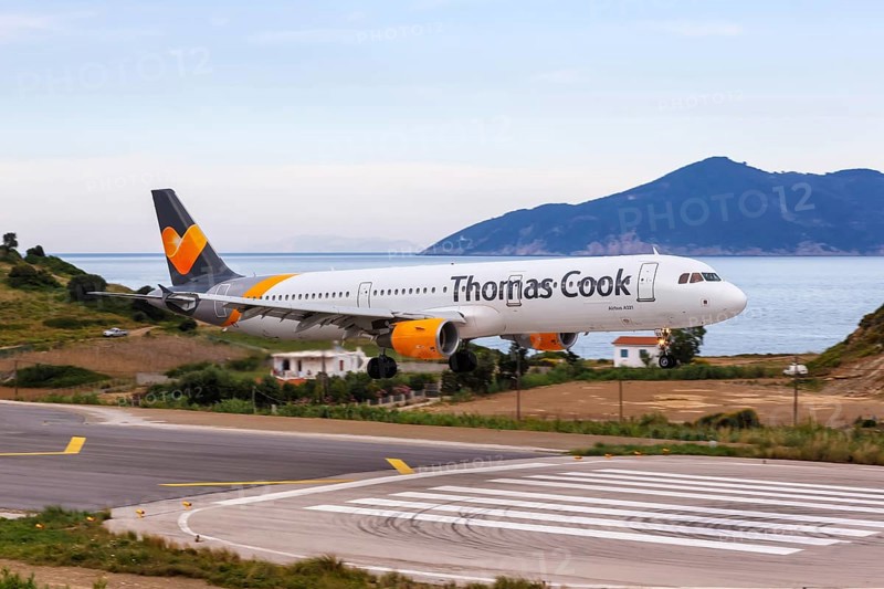 An Airbus A321 aircraft of Thomas Cook Airlines with registration G-TCDX at Skiathos Airport