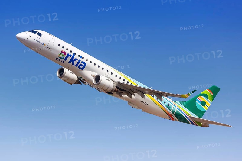An Arkia Embraer 195 with the registration 4X-EMA takes off from Tel Aviv Airport