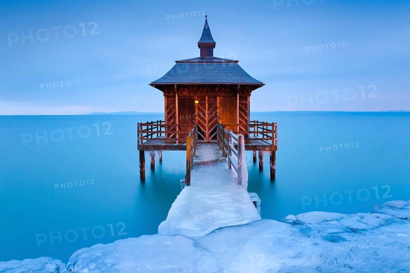 Iced bathhouse at dawn