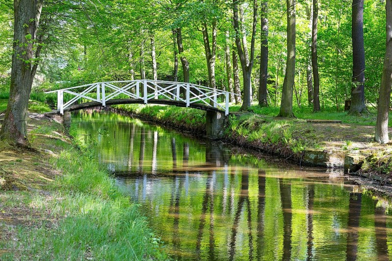 Bridge over the moat in the park of Hermsdorf Castle