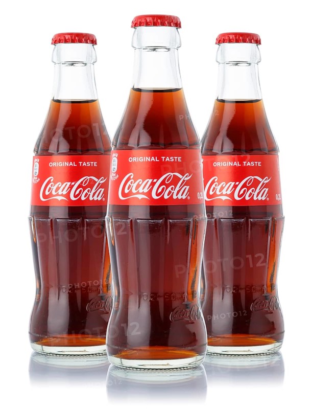 Coca Cola Coca-Cola soft drink beverage bottle cropped isolated against a white background in Germany