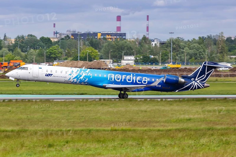 A Bombardier CRJ-900 aircraft of Nordica with registration number ES-ACB at Warsaw Airport