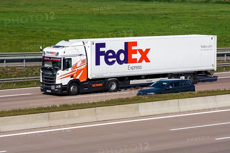 FedEx truck driving on the A8 motorway near Jettingen