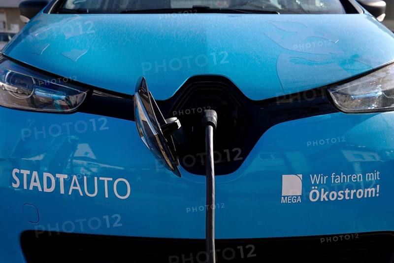 Electric car charging as city car for rent