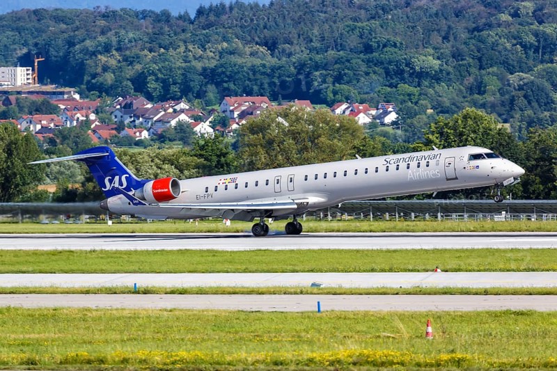 A Bombardier CRJ-900 of SAS Scandinavian Airlines with registration EI-FPV lands at Stuttgart Airport