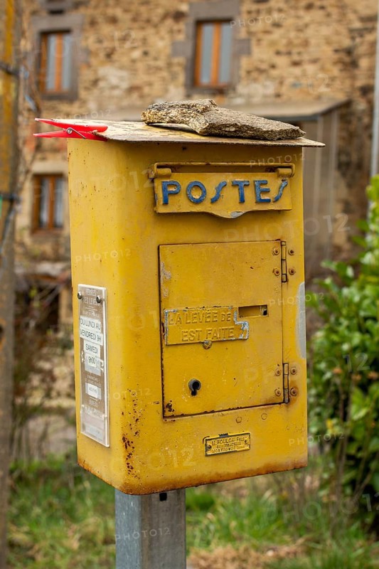 Old french metal postbox in countryside
