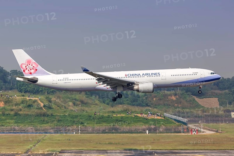 An Airbus A330-300 aircraft of China Airlines with registration number B-18303 at Chengdu airport