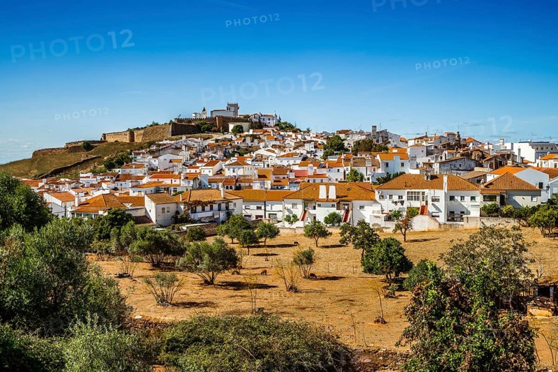 Cityscape of historic town with castle