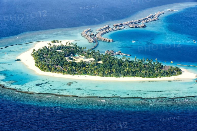 Island vacation paradise sea Halaveli Resort Ari Atoll aerial view tourism in Maldives