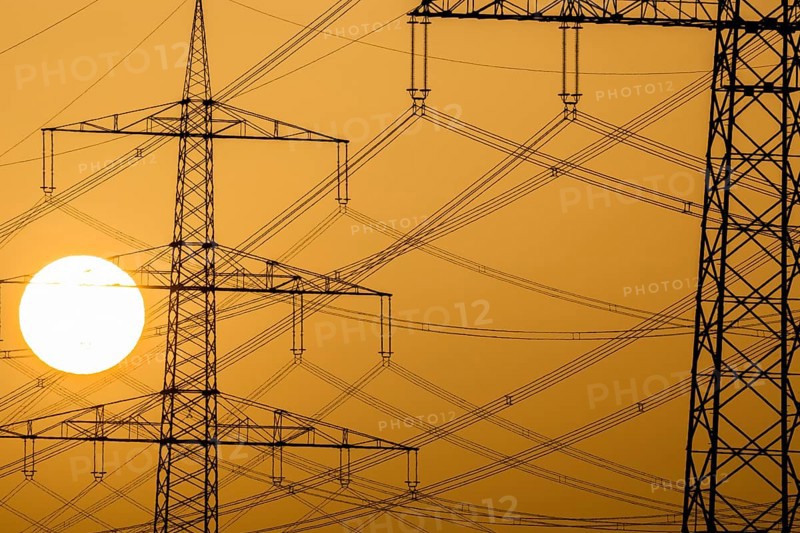 Power pylons at sunset