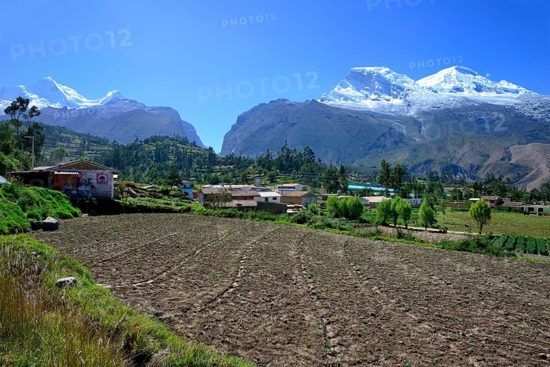 Village with view of Nevado Huandoy and Nevado Huascaran