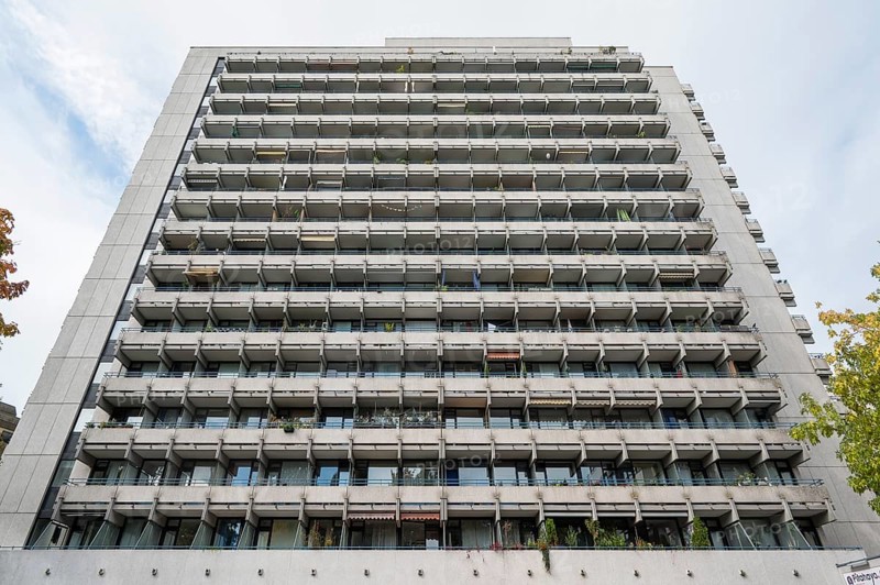 High-rise building with concrete balconies