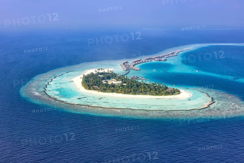 Island holiday paradise sea text free space copyspace Halaveli Resort Ari Atoll aerial photo tourism in the Maldives