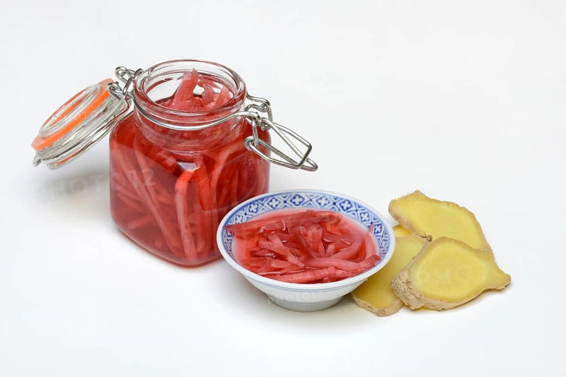 Pickled ginger in glass and peel