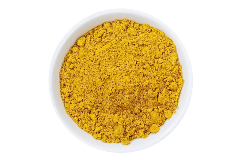 Curry powder curry powder spice from above clipping frame against a white background