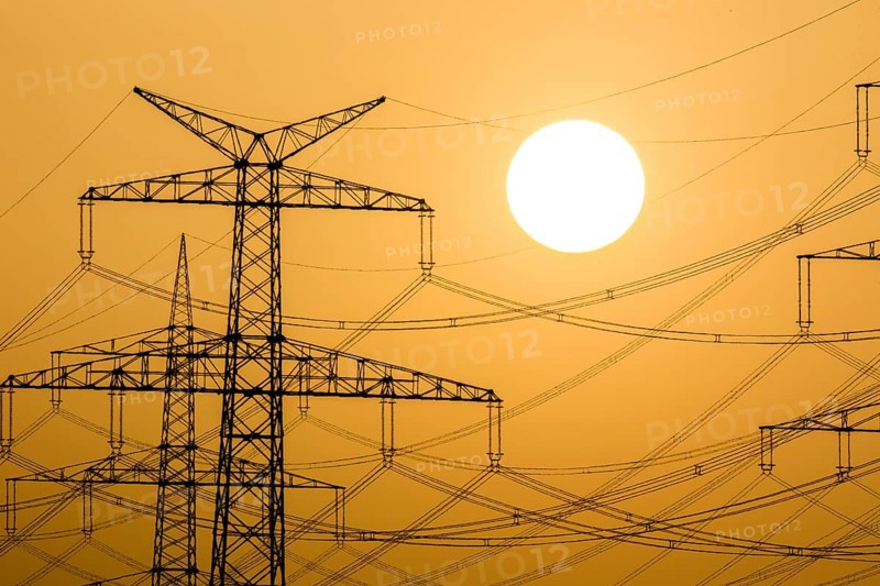 Power pylons at sunset