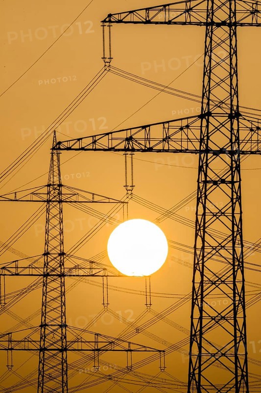 Power pylons at sunset