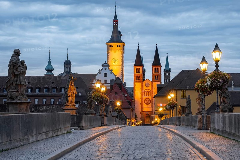 Old bridge over the river Main at dawn