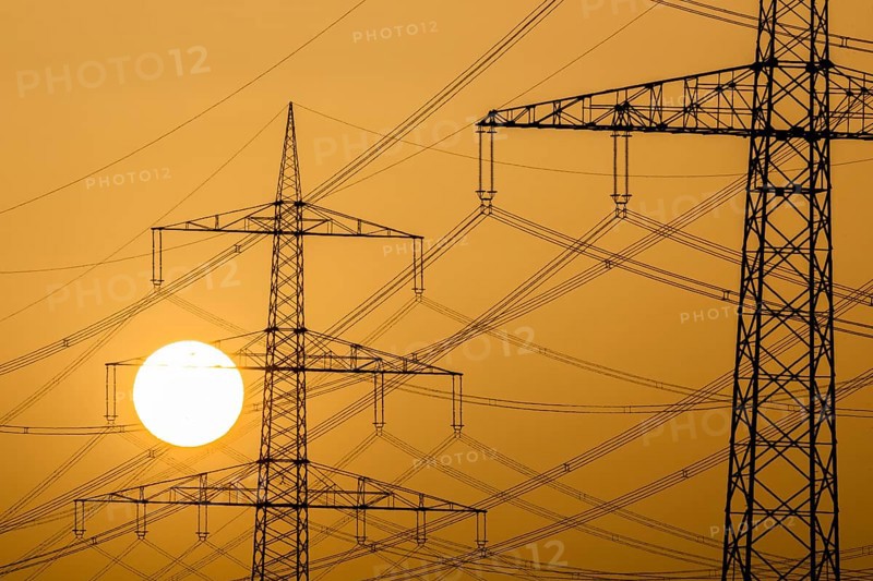Power pylons at sunset