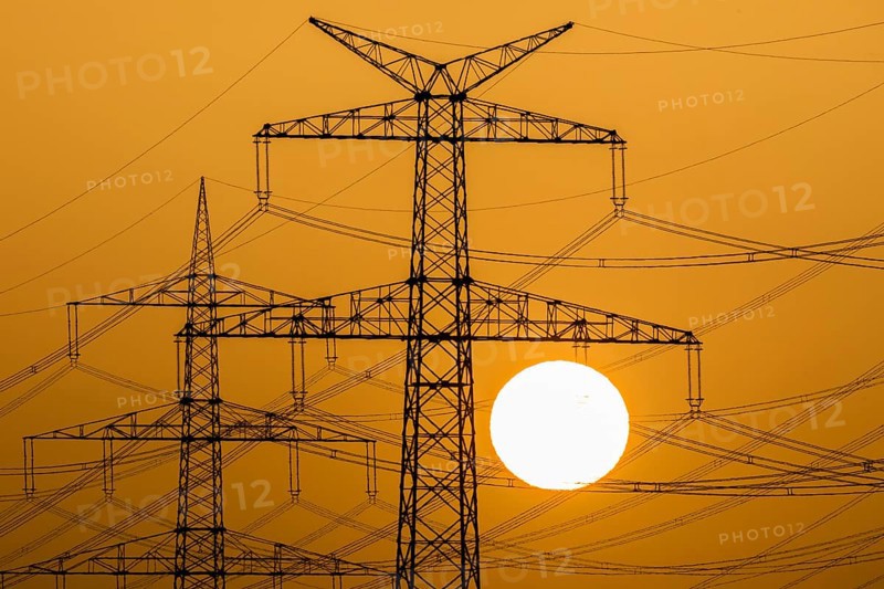 Power pylons at sunset