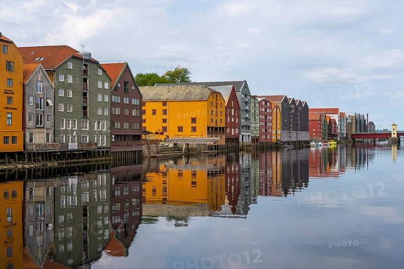 Colourful historic warehouses by the river Nidelva