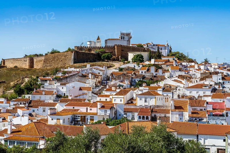Cityscape of historic town with castle