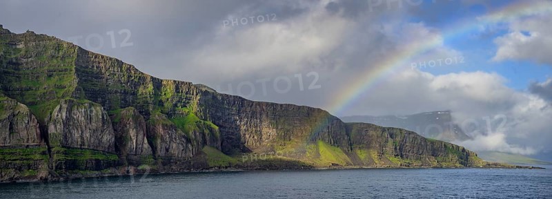 Rainbow at the entrance to the fjord of