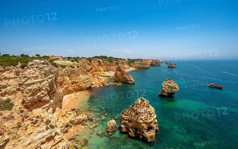 View of cliff of craggy sandstone rocks