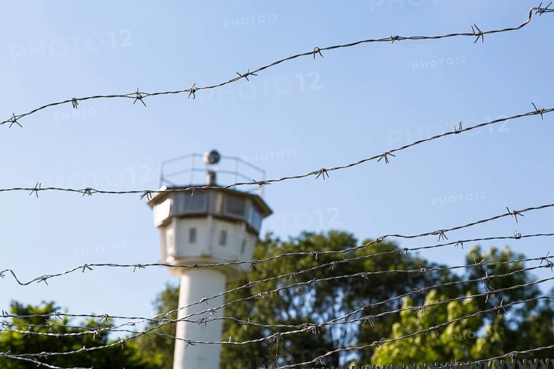 Barbed wire and historical observation tower