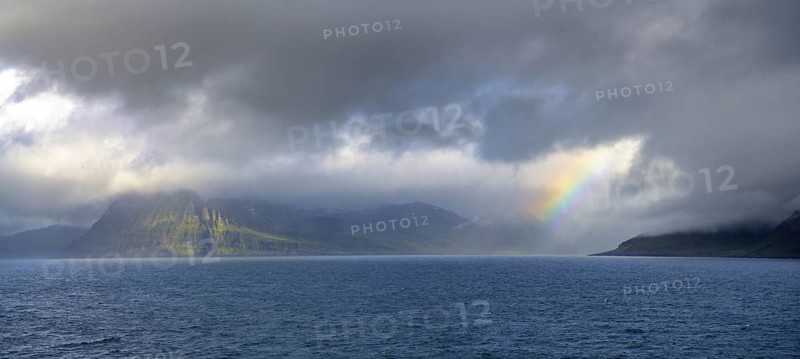 Rainbow at the entrance to the fjord of