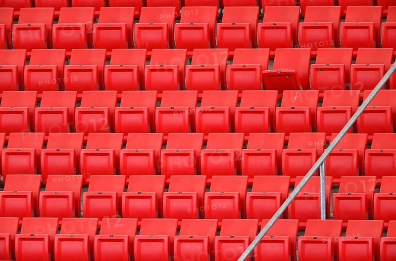 Red rows of seats on the grandstand