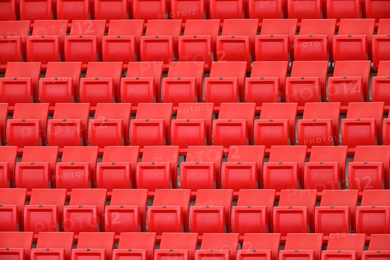 Red rows of seats on the grandstand