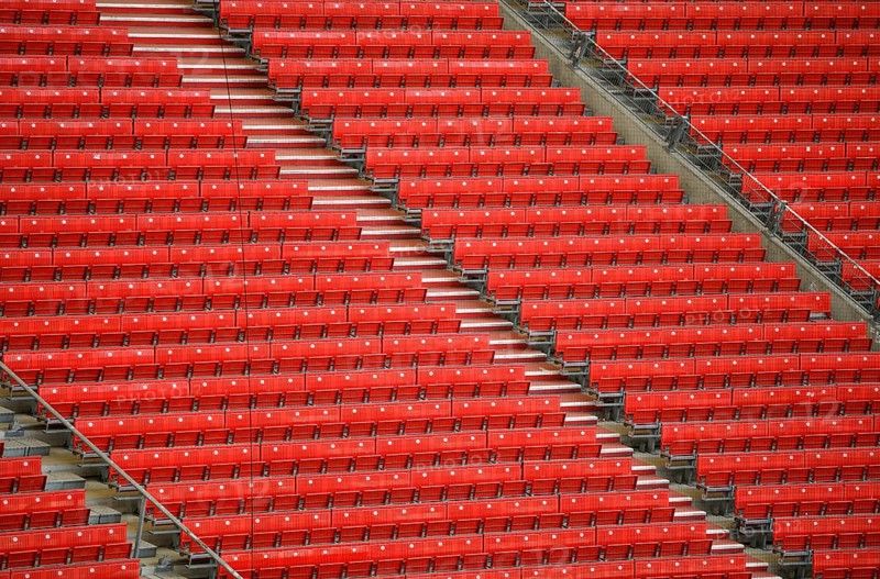 Red rows of seats on the grandstand