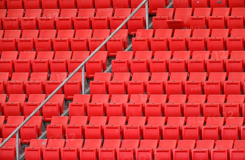 Red rows of seats on the grandstand